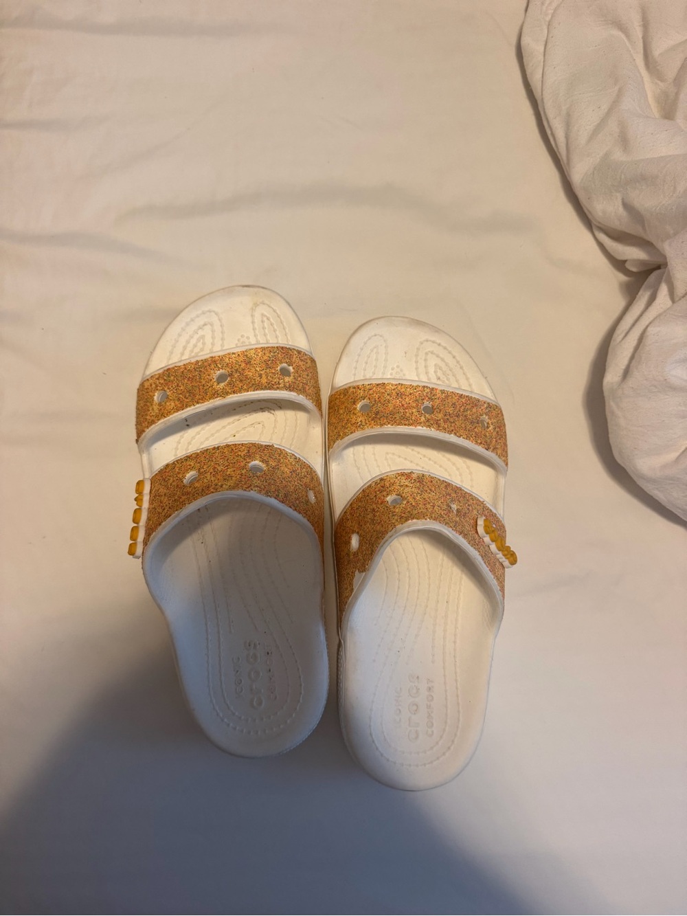 CROCS White Slide Sandals with Gold Glitter Straps